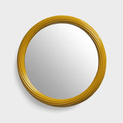 round mirror with brown color