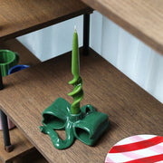 Dark Green candle holder with a ribbon shape