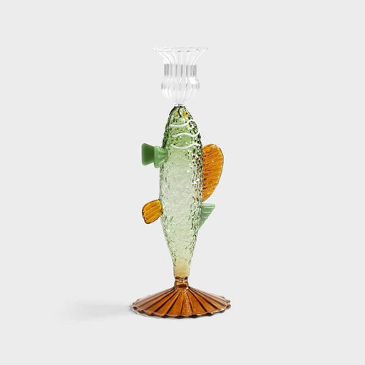 unique green candle holder with a fish-shaped design, adding a whimsical touch to home décor