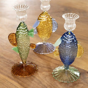 candle holders with a fish-shaped design, adding a whimsical touch to home décor