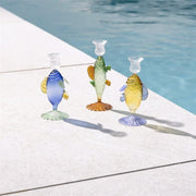 candle holders with a fish-shaped design, adding a whimsical touch to home décor