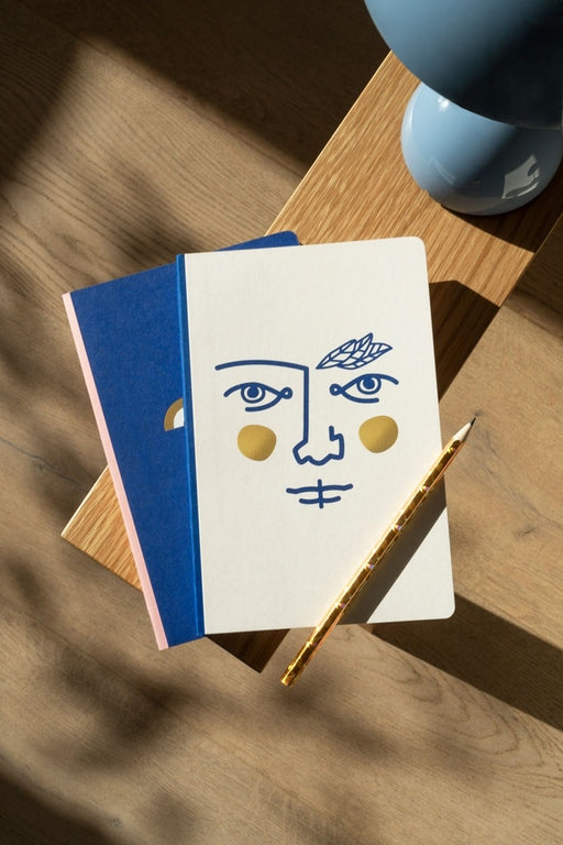 A5 notebook with a face