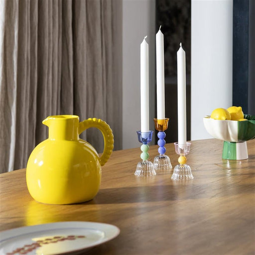 Yellow jug with a pearl handle