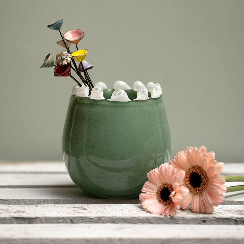 Round vase, green blown glass, ecru beaded edge