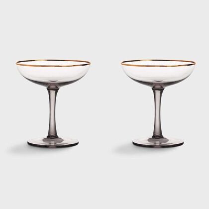 elegant smoked champagne coupes with golden rim are perfect for sparkling champagne