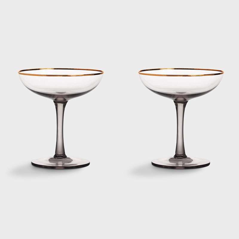 elegant smoked champagne coupes with golden rim are perfect for sparkling champagne