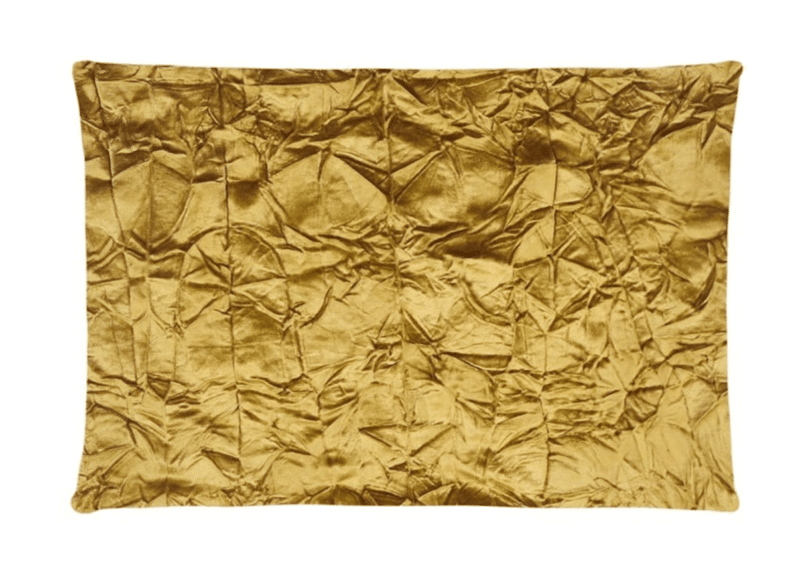 A gold cotton cushion