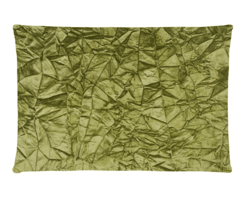 A green cotton cushion