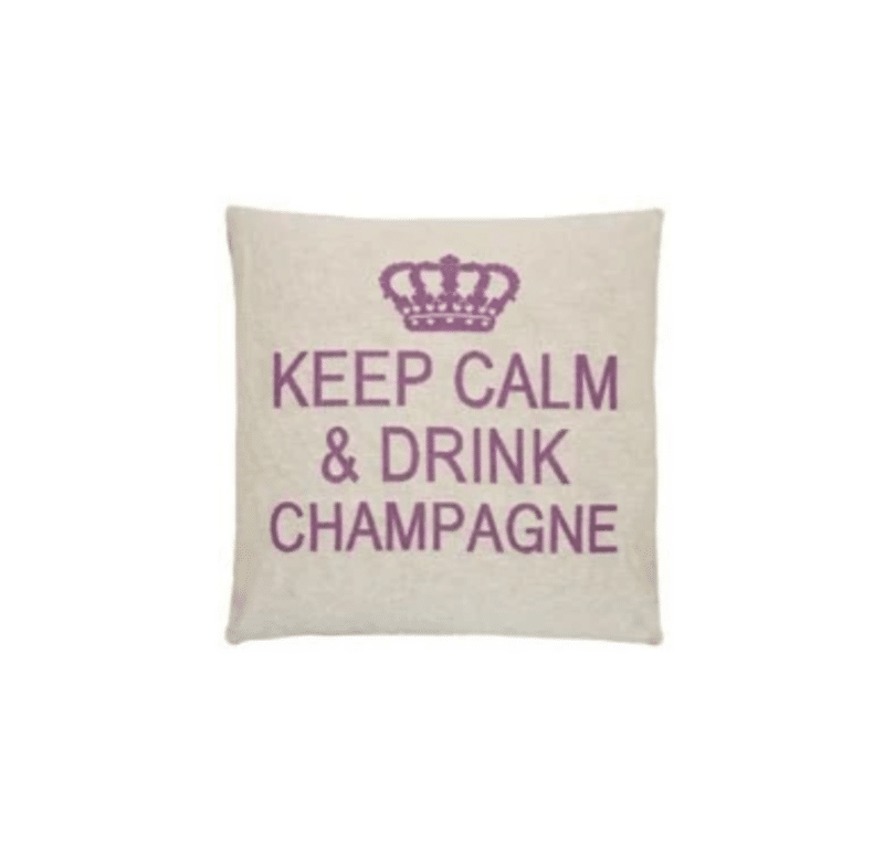 A beige cotton cushion with a phrase Keep Calm & Drink Champagne on it