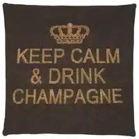 A brown cotton cushion with a phrase Keep Calm & Drink Champagne on it