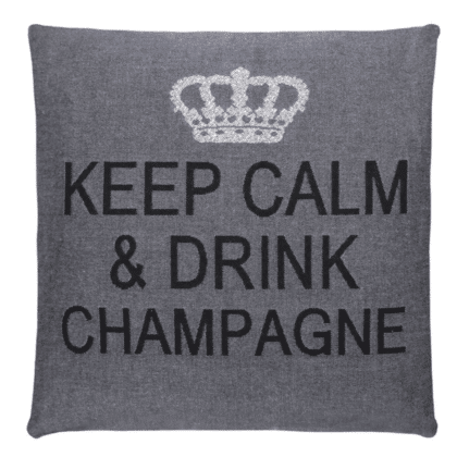 A grey cotton cushion with a phrase Keep Calm & Drink Champagne on it
