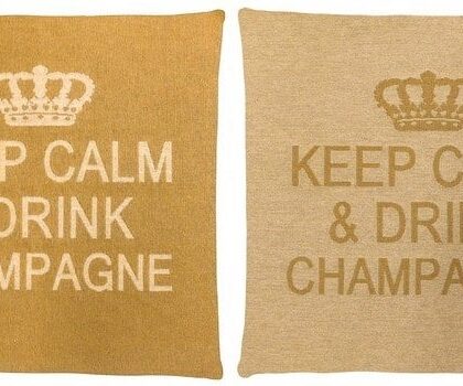 2 gold cotton cushions with a phrase Keep Calm & Drink Champagne on it