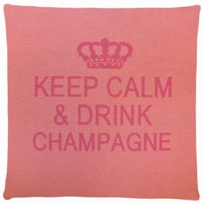 A light pink cotton cushion with a phrase Keep Calm & Drink Champagne on it