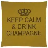 A yellow cotton cushion with a phrase Keep Calm & Drink Champagne on it