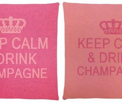 2 pink cotton cushion with a phrase Keep Calm & Drink Champagne on it