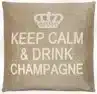A sand cotton cushion with a phrase Keep Calm & Drink Champagne on it