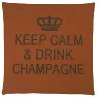An orange cotton cushion with a phrase Keep Calm & Drink Champagne on it