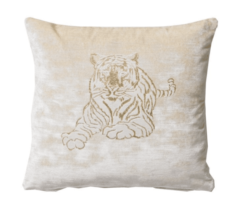 A beige cotton velvet cushion with a panther pattern