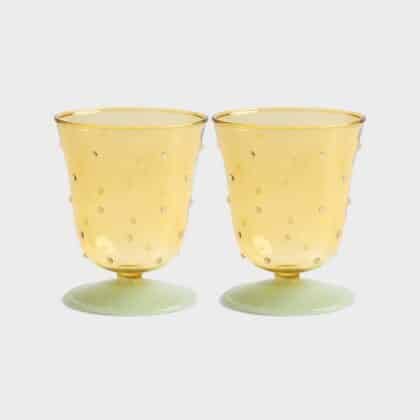 2 yellow water glass with dots on it