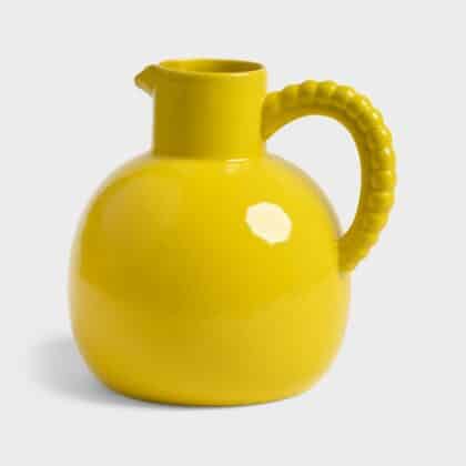 Yellow jug with a pearl handle