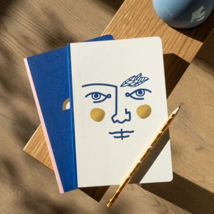 A5 notebook with a face