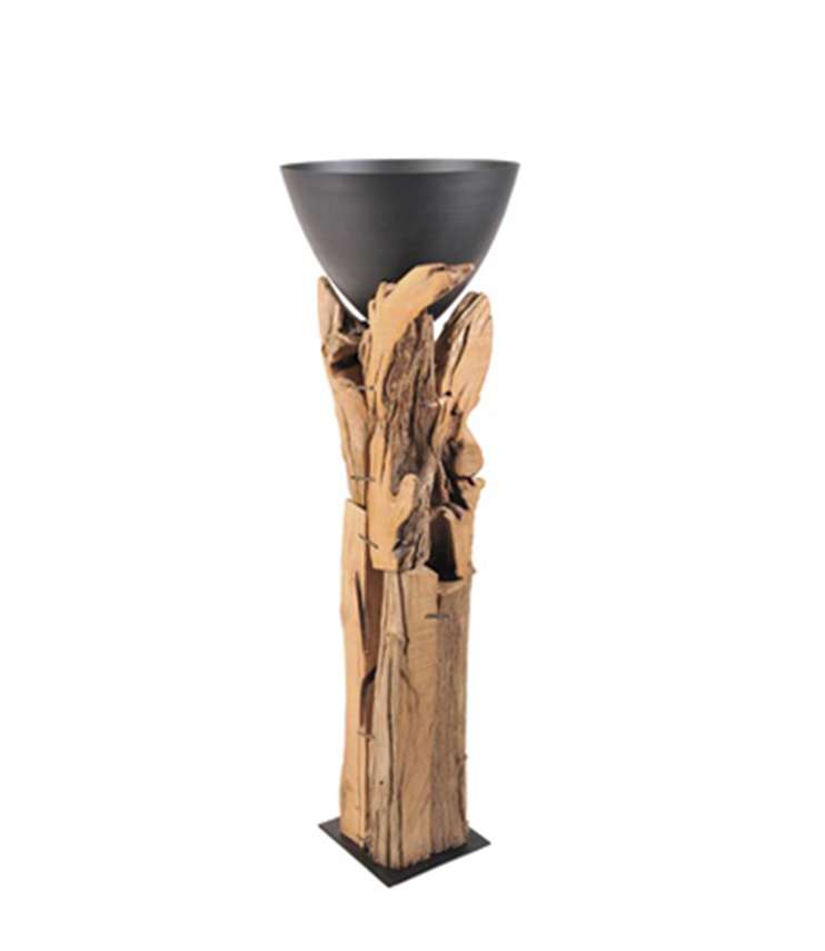 iron vase on wood stand schlittler